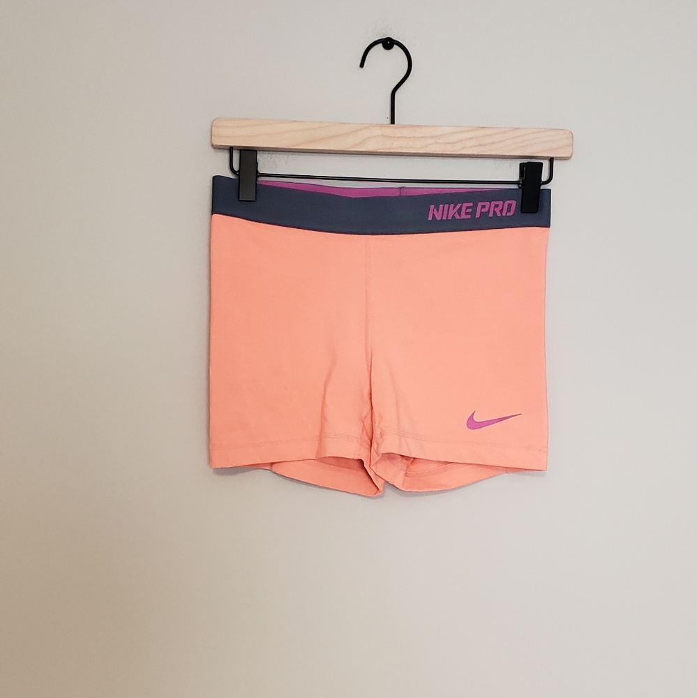 Nike Pro Peach Athletic Shorts with Gray Waistband and Pink Logo
